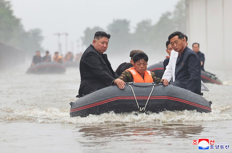 This photo released by North Korea's government on July 31, 2024, and not independently verifiable shows leader Kim Jong Un visiting flooded areas  after record-breaking heavy rains in North Pyongan province.